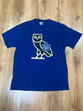 OVO Blue Tee with Gold Owl & Maple Leafs Crest